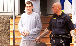 Michael Man of Russell is escorted out of provincial court at the Rossburn Community Hall by sheriffs on Wednesday after a sentencing hearing. Man, 46 was previously convicted of uttering threats and later pleaded guilty to three additional counts.