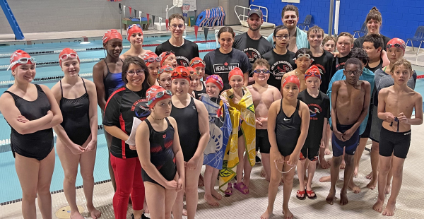 Local swimmers hit the water with Olympian