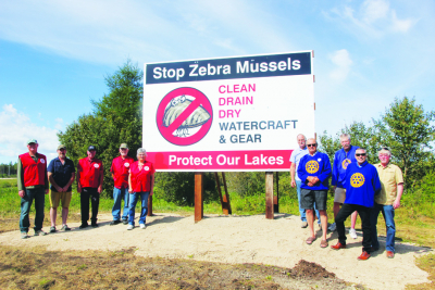 Sign advocates to stop the spread of Zebra Mussels