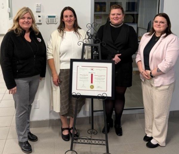 Young receives award from Red Cross