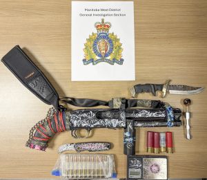 Man breaching release conditions found with weapons, drug paraphernalia
