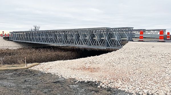 Manitoba Transportation and Infrastructure installed this temporary Acrow modular steel bridge over the Morris River near Brunkild in 2025 following an emergency closure of PTH #3.